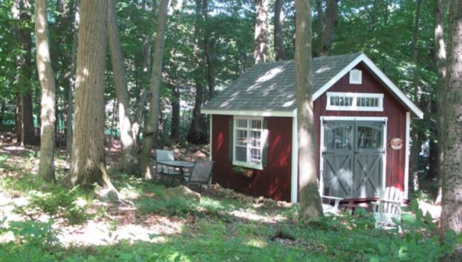 Cambridge-Red shed with grey shingle roof