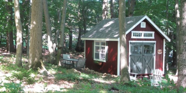 Cambridge-Red shed with grey shingle roof