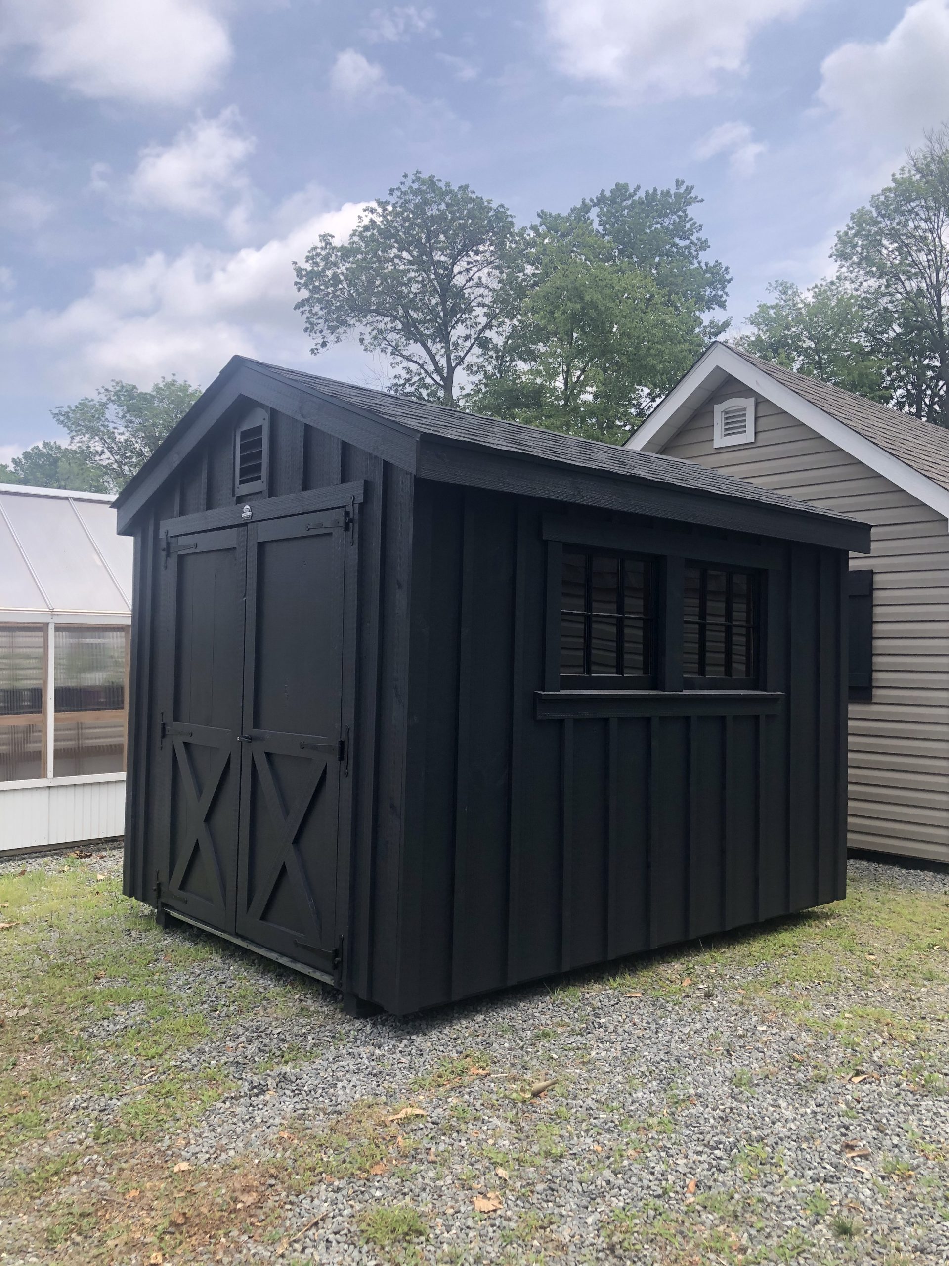 Winchester-Black shed w/ black shingle roof